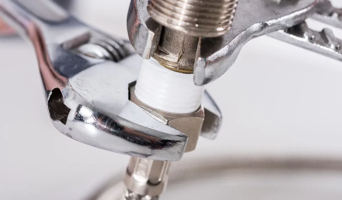 Plumber doing a maintenance in Central Oregon home.