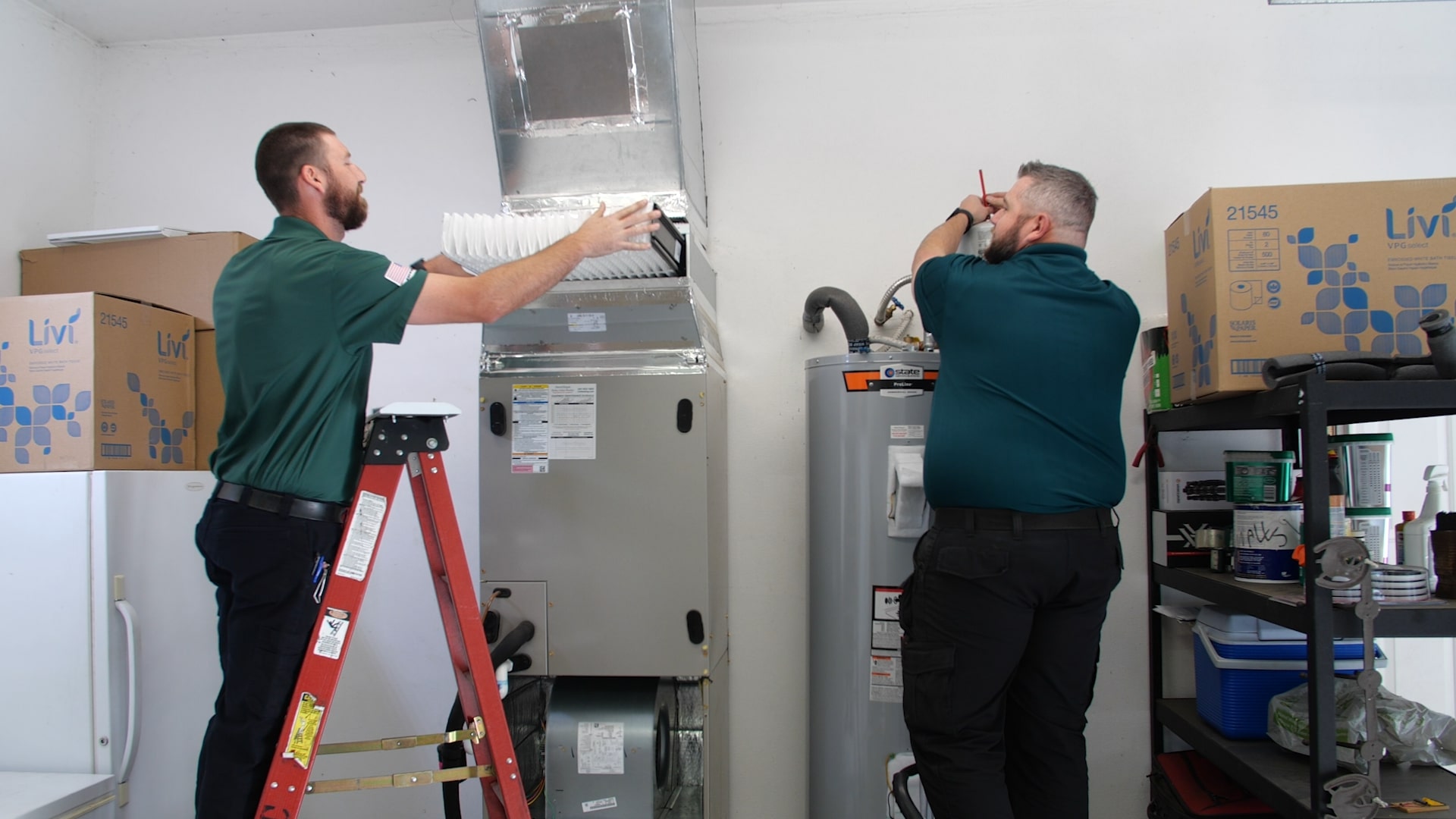 Image of Central Oregon Heating technicians servicing a Bend customer's home