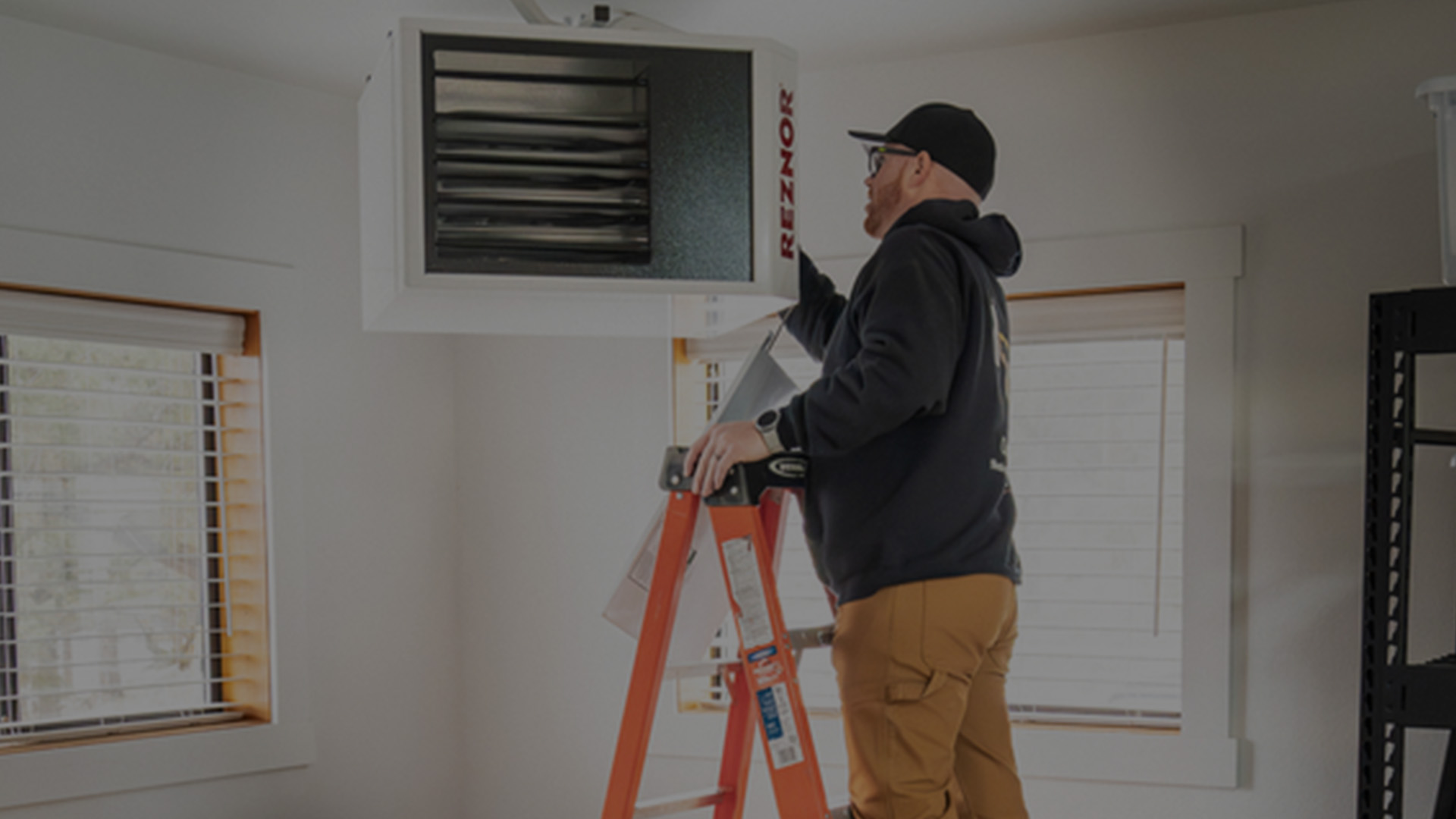 HVAC technician servicing a heating system in Central Oregon.